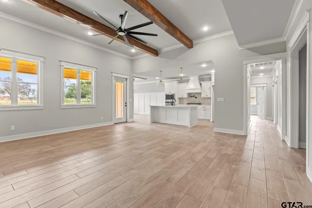 a view of a kitchen with a sink and a window