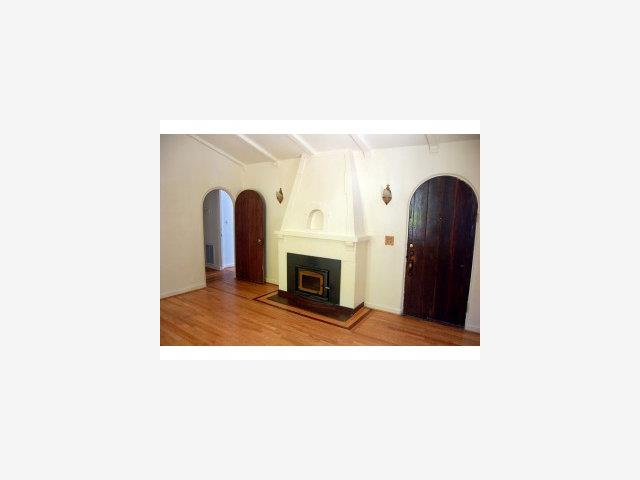 10024 East Zayante Road Felton, CA 95018 - Photo 6 of 8 a view of a living room with a fireplace
