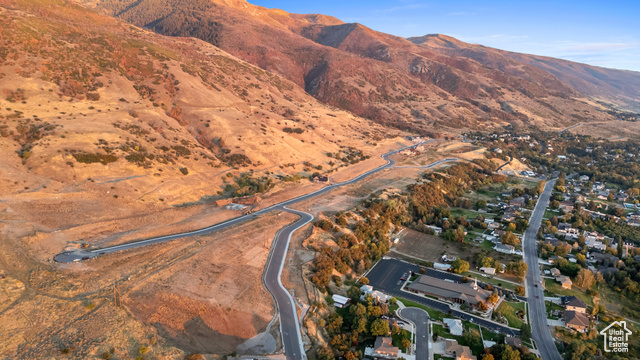 159 Rock Loft Ridge Drive, Unit 59R Fruit Heights, UT 84037 - Photo 15 of 17 Aerial view of property and surrounding area with a mountainous background