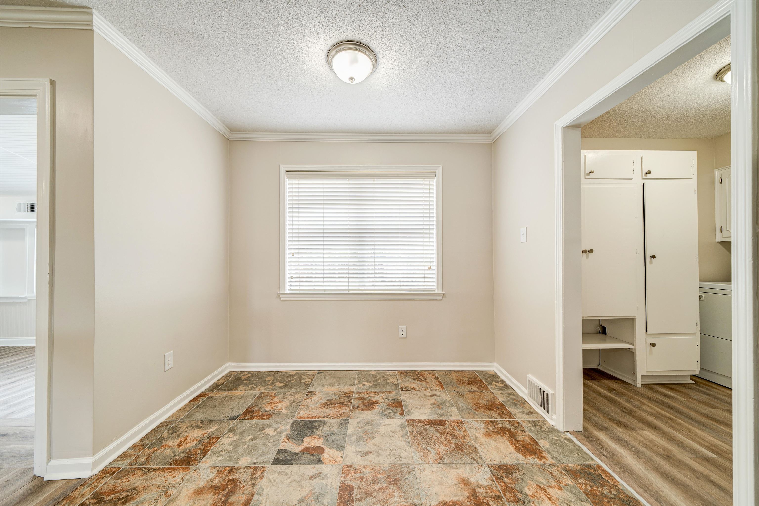 2487 Lynnfield Road Memphis, TN 38119 - Photo 12 of 33 an empty room with a dresser