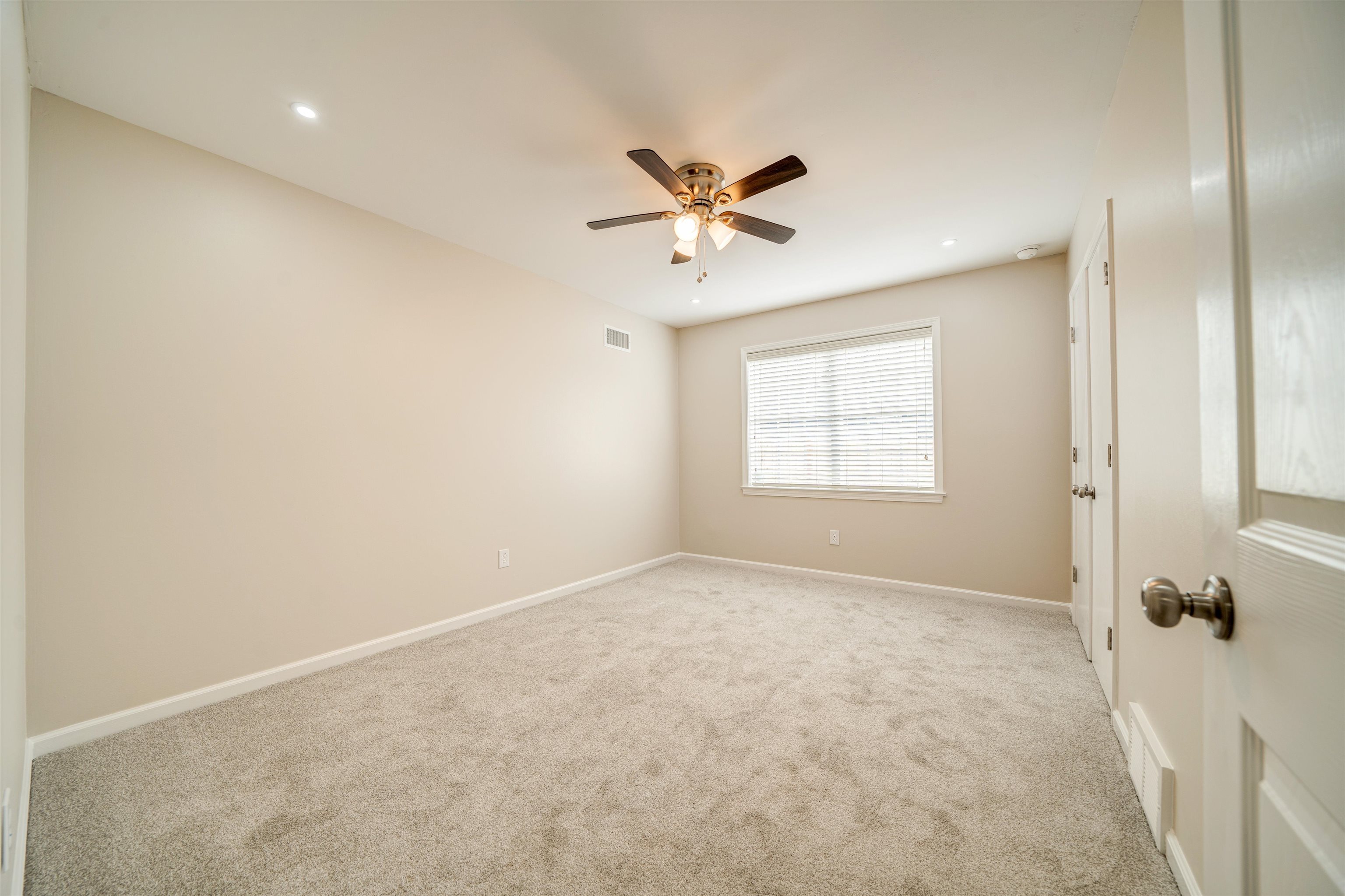 2487 Lynnfield Road Memphis, TN 38119 - Photo 24 of 33 a view of an empty room and a window