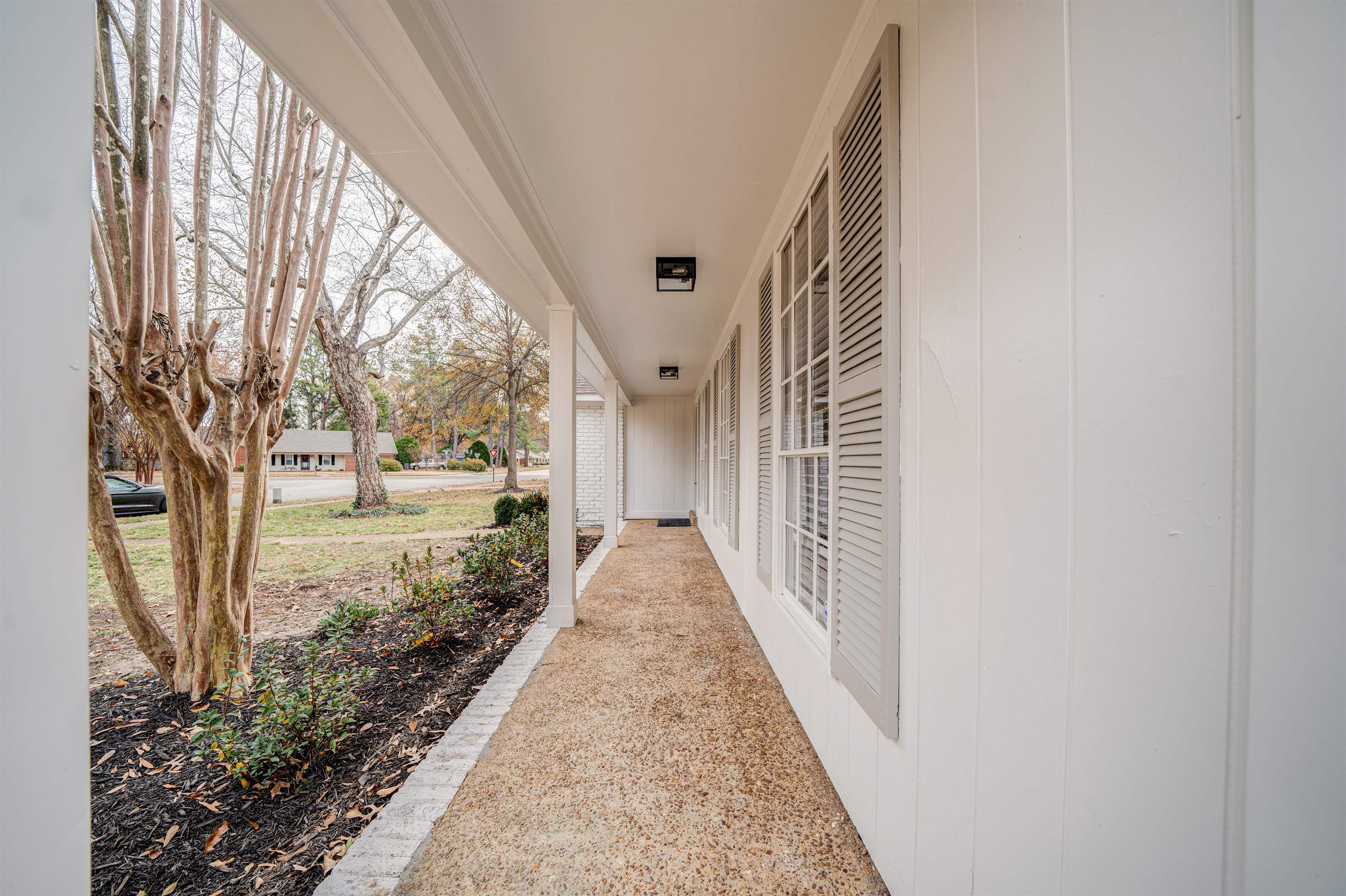 2487 Lynnfield Road Memphis, TN 38119 - Photo 3 of 33 a view of a porch with pathway