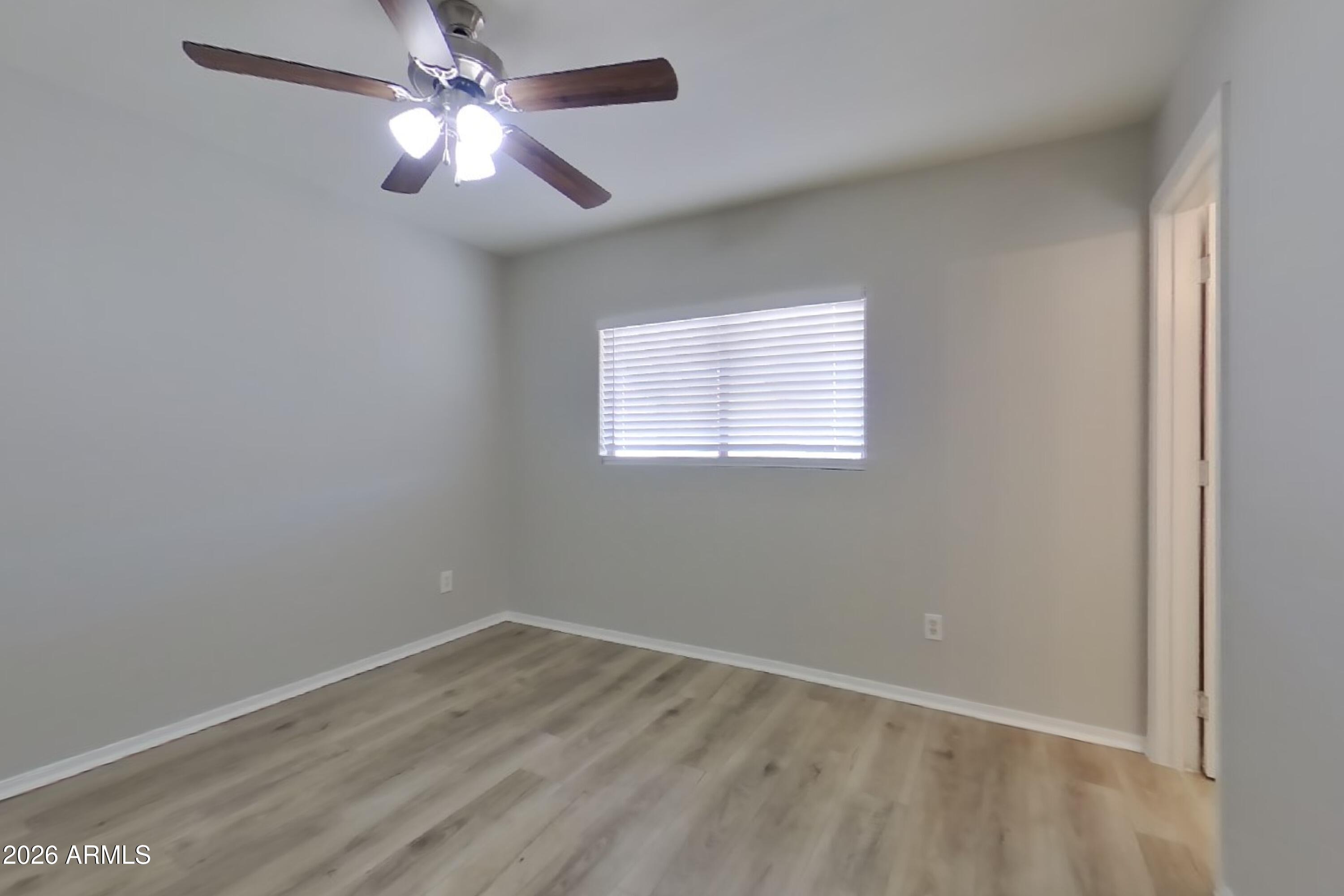 11514 West Wethersfield Road El Mirage, AZ 85335 - Photo 8 of 28 6_Image_CMJhZMl2NY