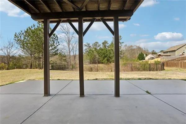 a view of swimming pool with a porch