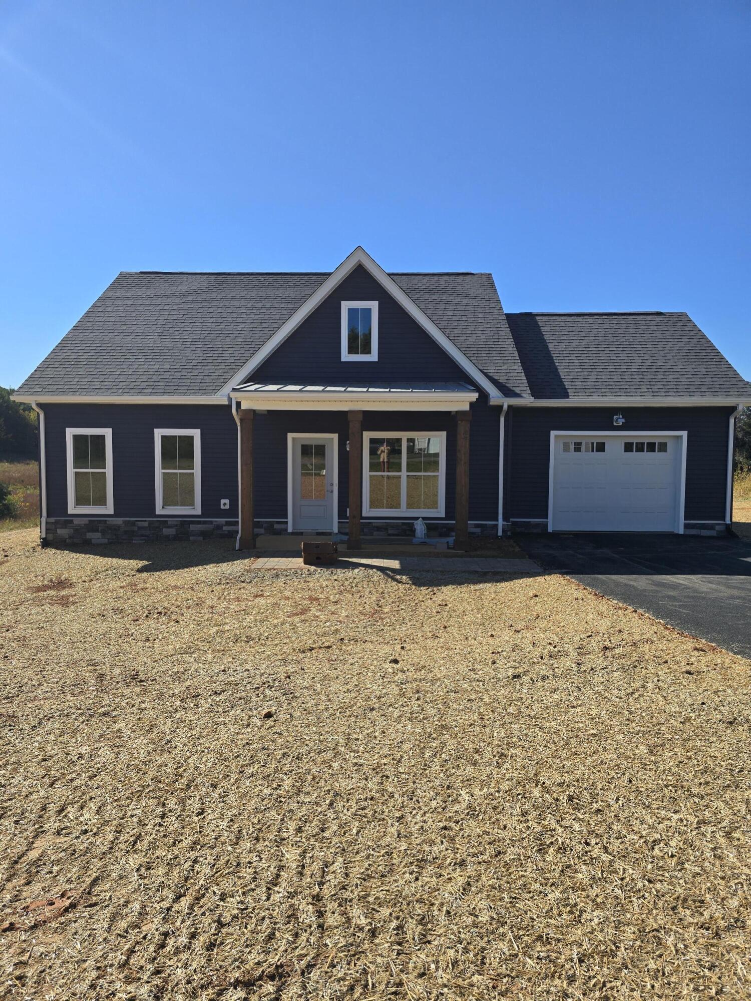 1544 Burnt Chimney Road Wirtz, VA 24184 - Photo 1 of 28 a front view of a house with a yard
