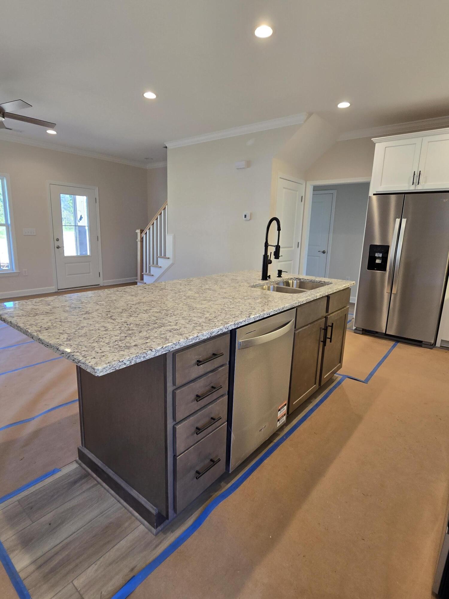 1544 Burnt Chimney Road Wirtz, VA 24184 - Photo 24 of 28 a view wooden cabinets with sink and refrigerator