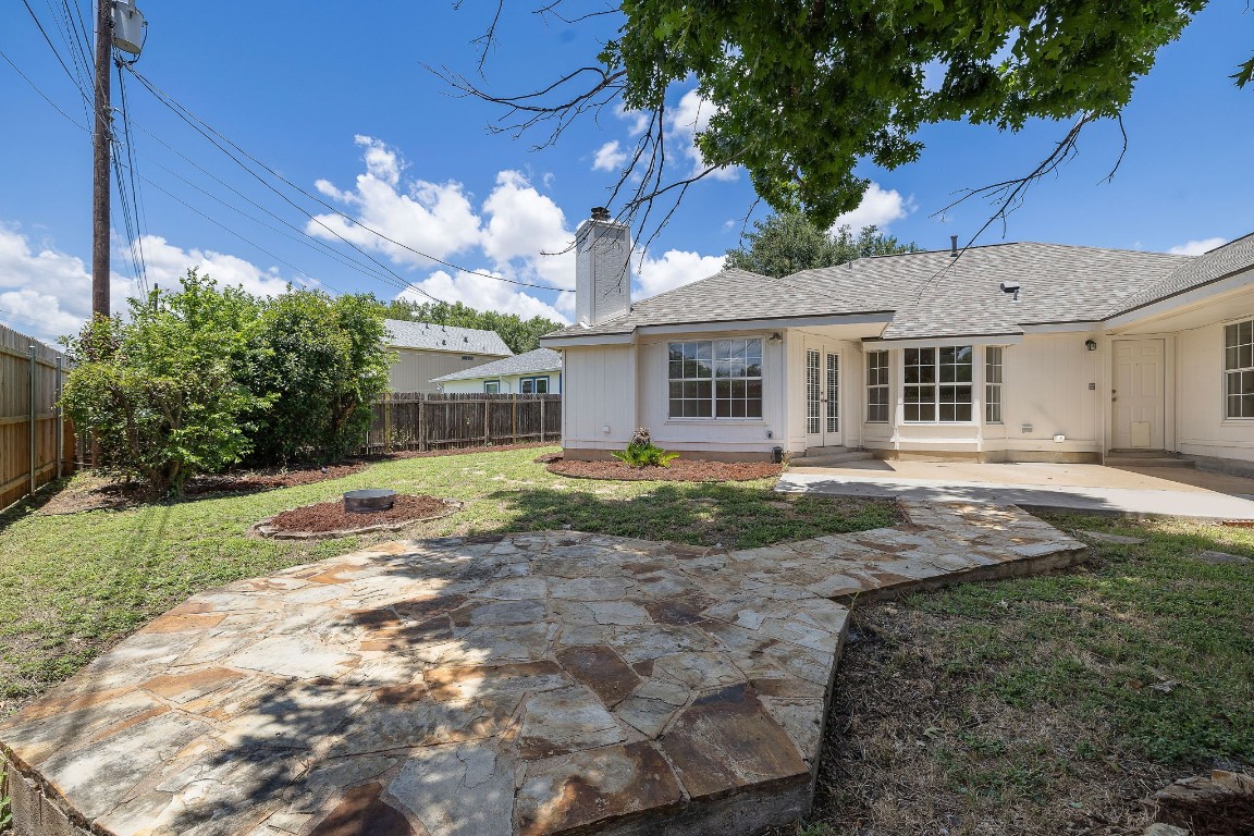 1815 Rusty Nail Loop Round Rock, TX 78681 - Photo 21 of 27 a view of a house with a yard