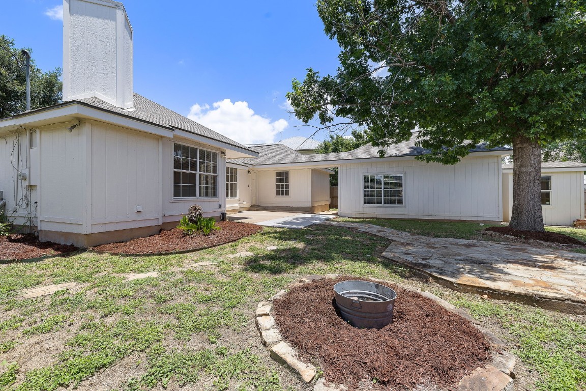1815 Rusty Nail Loop Round Rock, TX 78681 - Photo 22 of 27 a view of a house with backyard and sitting area