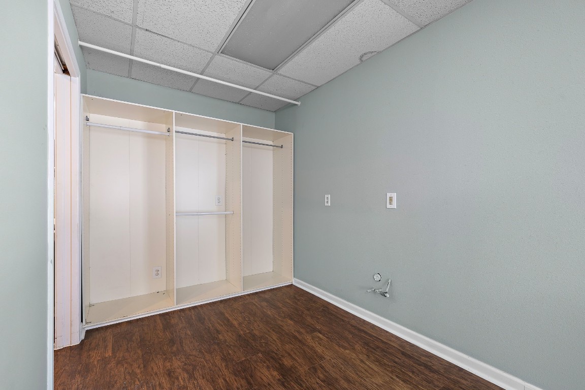1815 Rusty Nail Loop Round Rock, TX 78681 - Photo 24 of 27 a view of an empty room with wooden floor