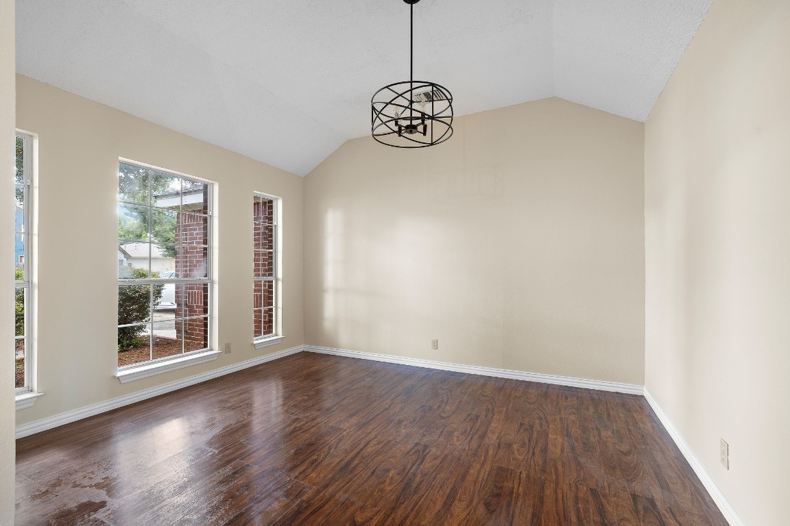 1815 Rusty Nail Loop Round Rock, TX 78681 - Photo 6 of 27 a view of wooden floor and window in a room