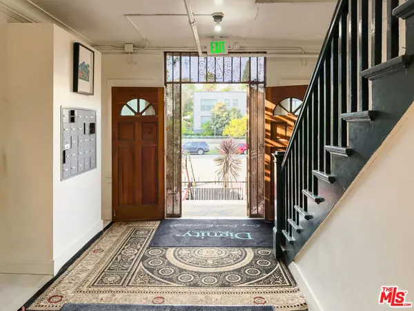 a view of an entryway with a rug