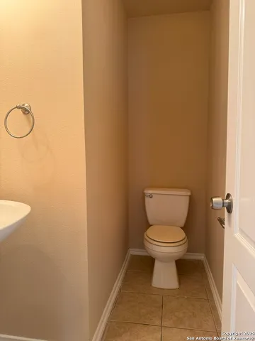 a bathroom with a toilet