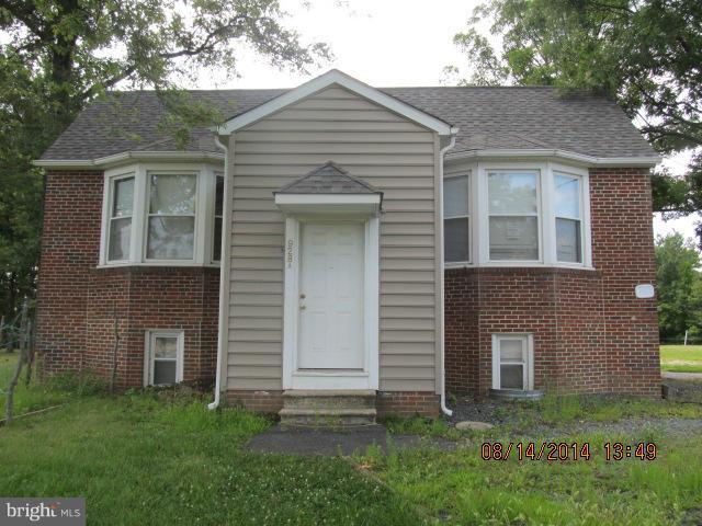 930 Middle River Road Baltimore, MD 21220 - Photo 2 of 2 a front view of a house with a garden