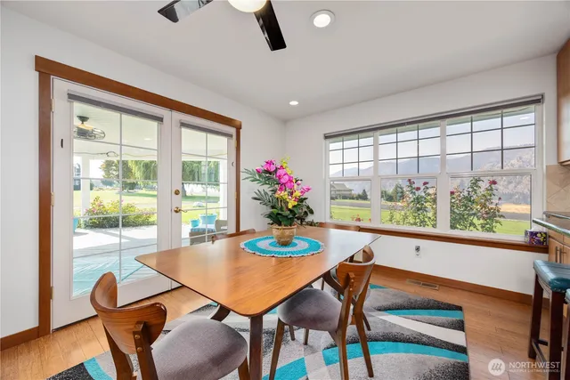 a dining room with furniture and window or wooden floor