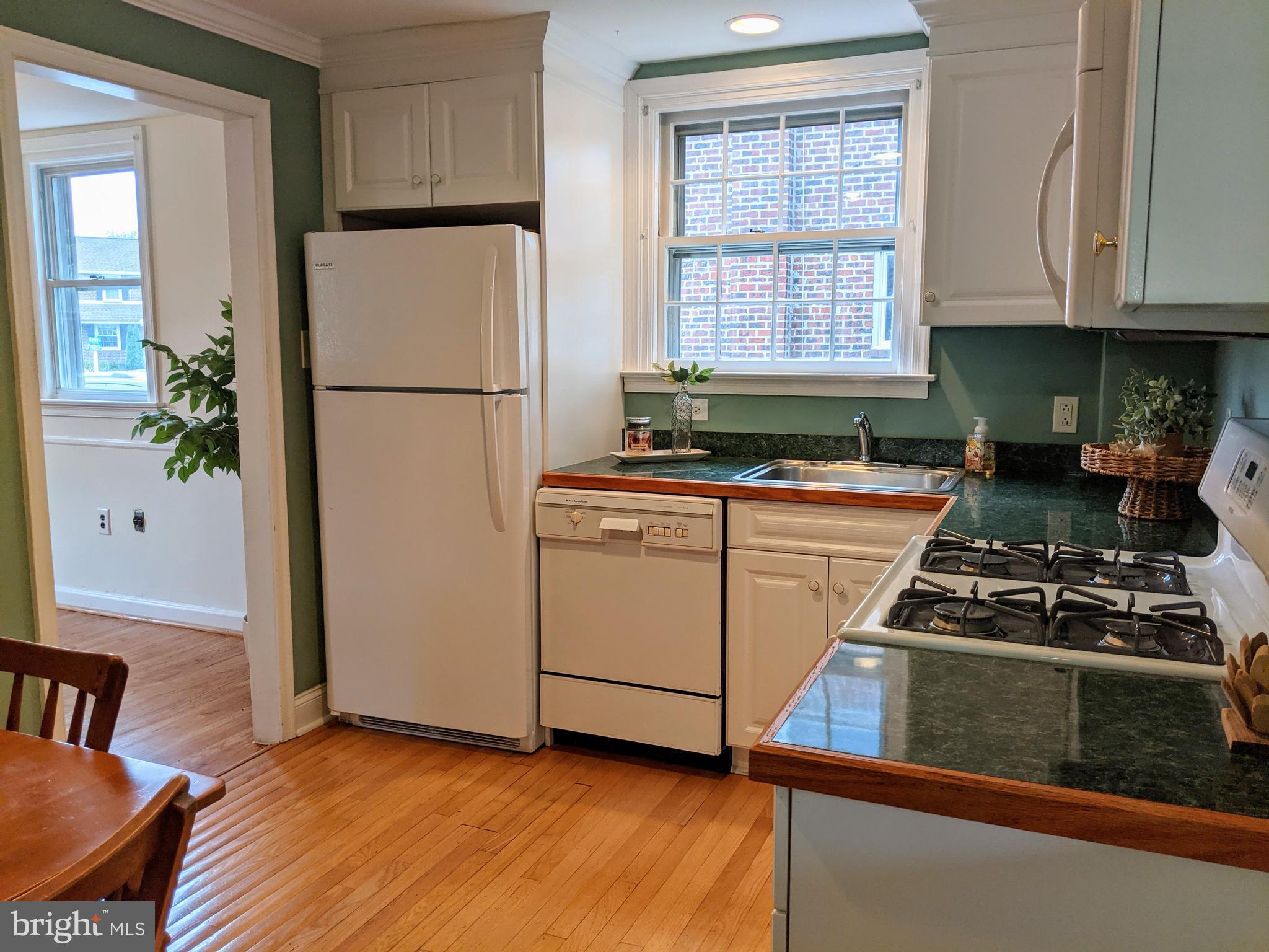 210 Paddock Road Havertown, PA 19083 - Photo 12 of 28 White cabinetry, and Hardwoods in Kitchen.
