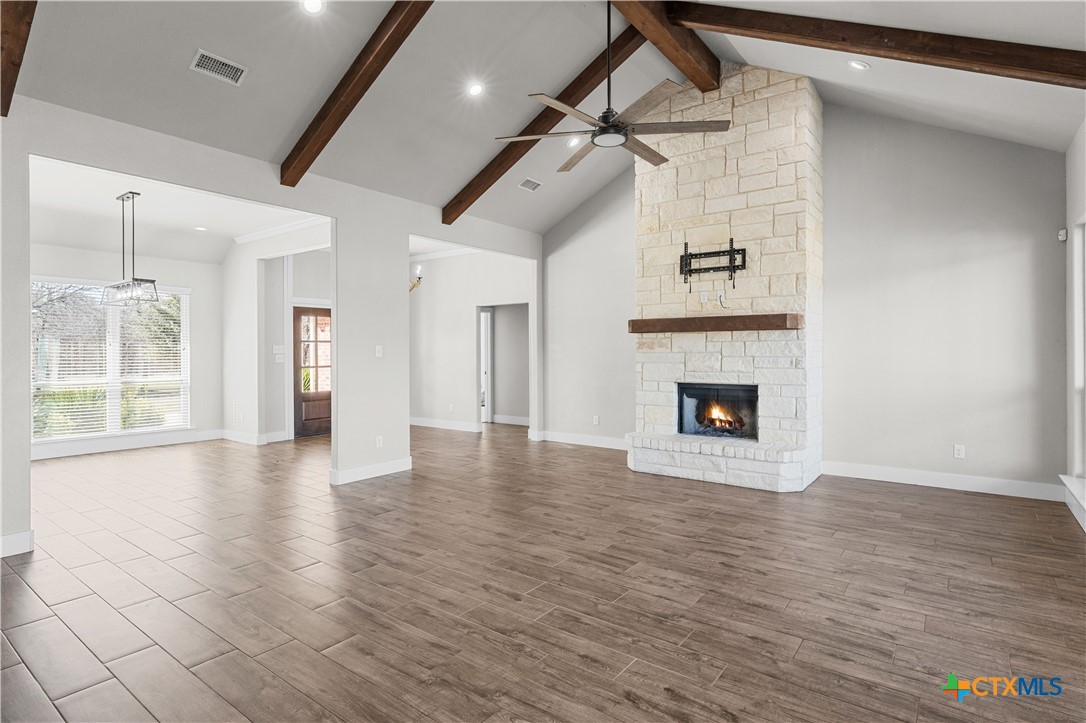 15020 Old Troy Road Troy, TX 76579 - Photo 11 of 48 a view of an empty room with wooden floor and a window
