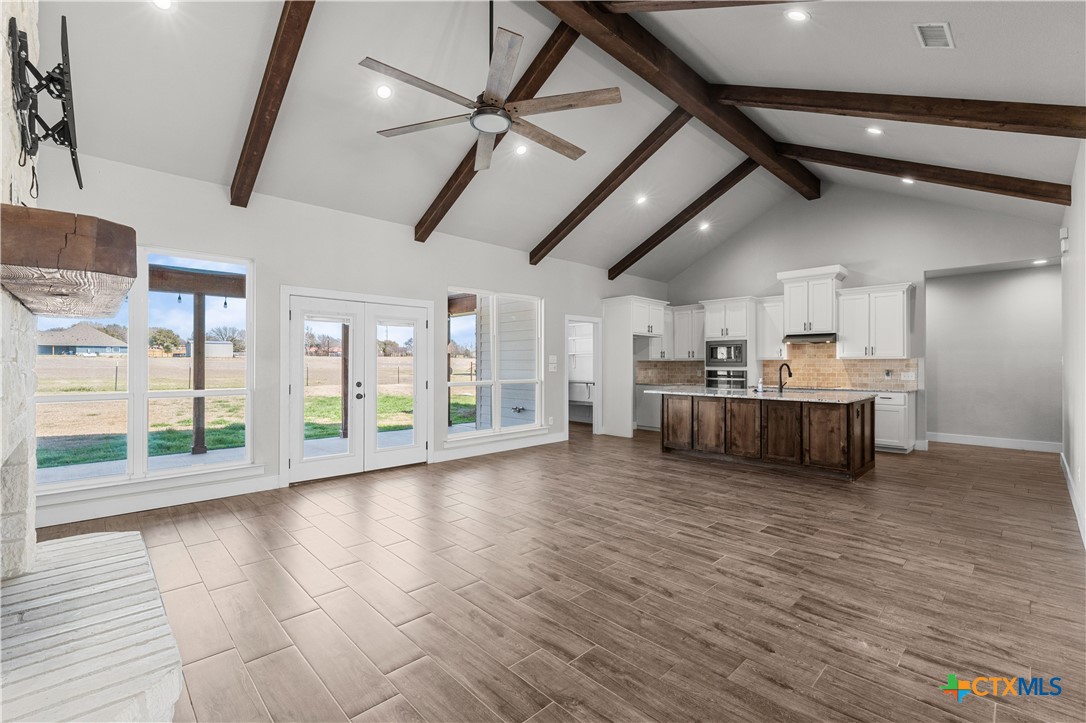 15020 Old Troy Road Troy, TX 76579 - Photo 14 of 48 a view of a kitchen with furniture and wooden floor