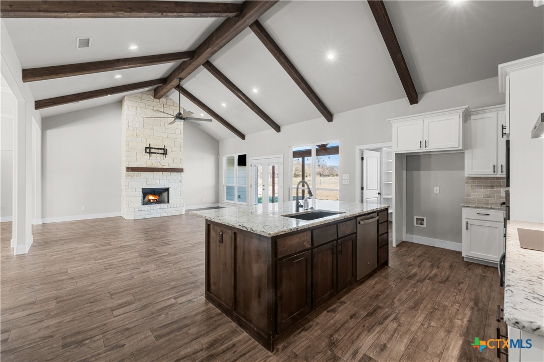 15020 Old Troy Road Troy, TX 76579 - Photo 19 of 48 a kitchen with stainless steel appliances granite countertop a sink a stove and refrigerator