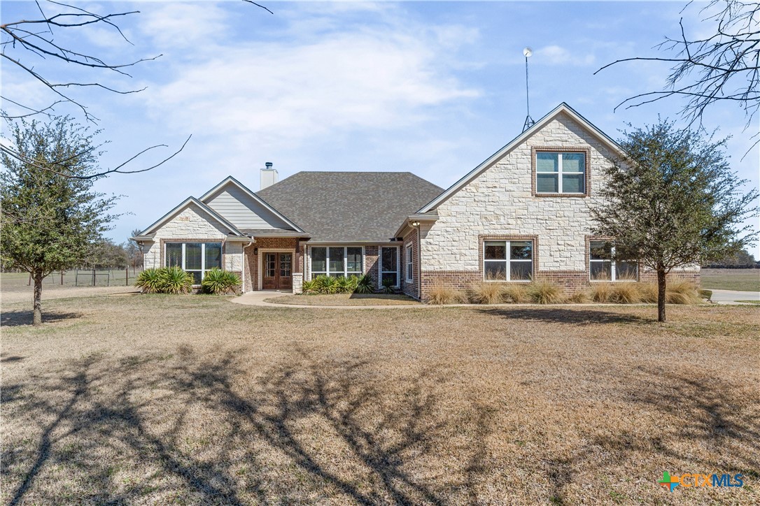 15020 Old Troy Road Troy, TX 76579 - Photo 2 of 48 a front view of a house with a yard