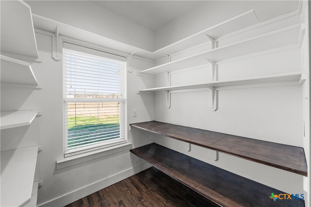 15020 Old Troy Road Troy, TX 76579 - Photo 21 of 48 a view of room with window and cabinet