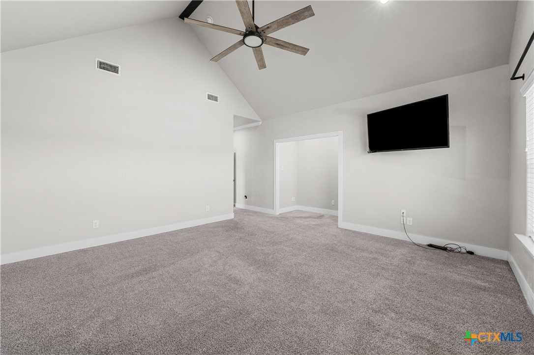 15020 Old Troy Road Troy, TX 76579 - Photo 33 of 48 an empty room with windows and fan
