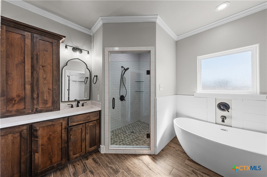 15020 Old Troy Road Troy, TX 76579 - Photo 35 of 48 a bathroom with a double vanity sink mirror and shower
