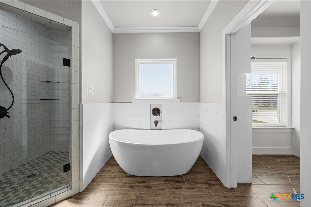 15020 Old Troy Road Troy, TX 76579 - Photo 37 of 48 a white bath tub sitting next to a shower