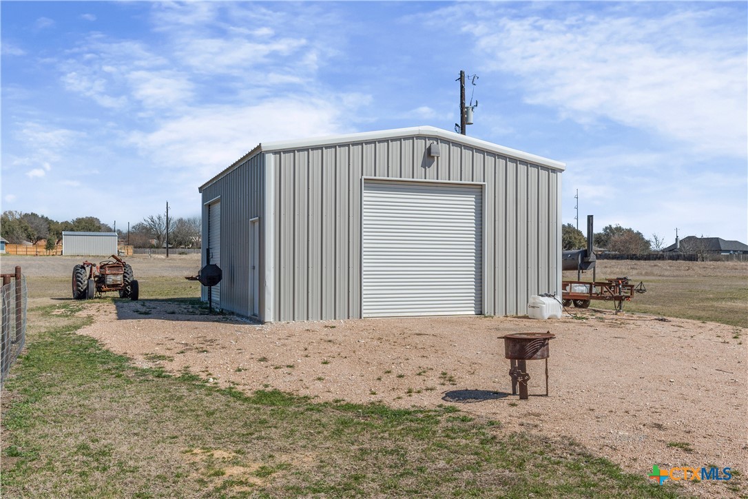 15020 Old Troy Road Troy, TX 76579 - Photo 47 of 48 a front view of a house with yard covered in snow