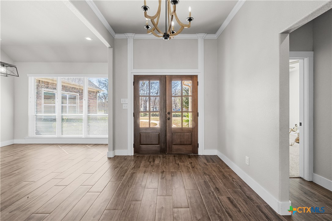 15020 Old Troy Road Troy, TX 76579 - Photo 6 of 48 wooden floor in an empty room with a window