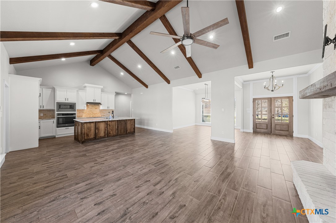 15020 Old Troy Road Troy, TX 76579 - Photo 10 of 48 a view of a livingroom with wooden floor