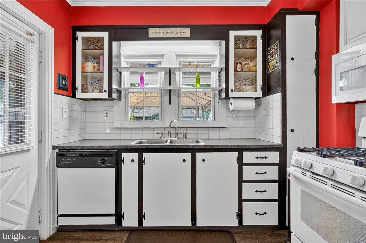 54 Chestnut Street Pottstown, PA 19464 - Photo 14 of 44 a kitchen with stainless steel appliances granite countertop a sink and cabinets