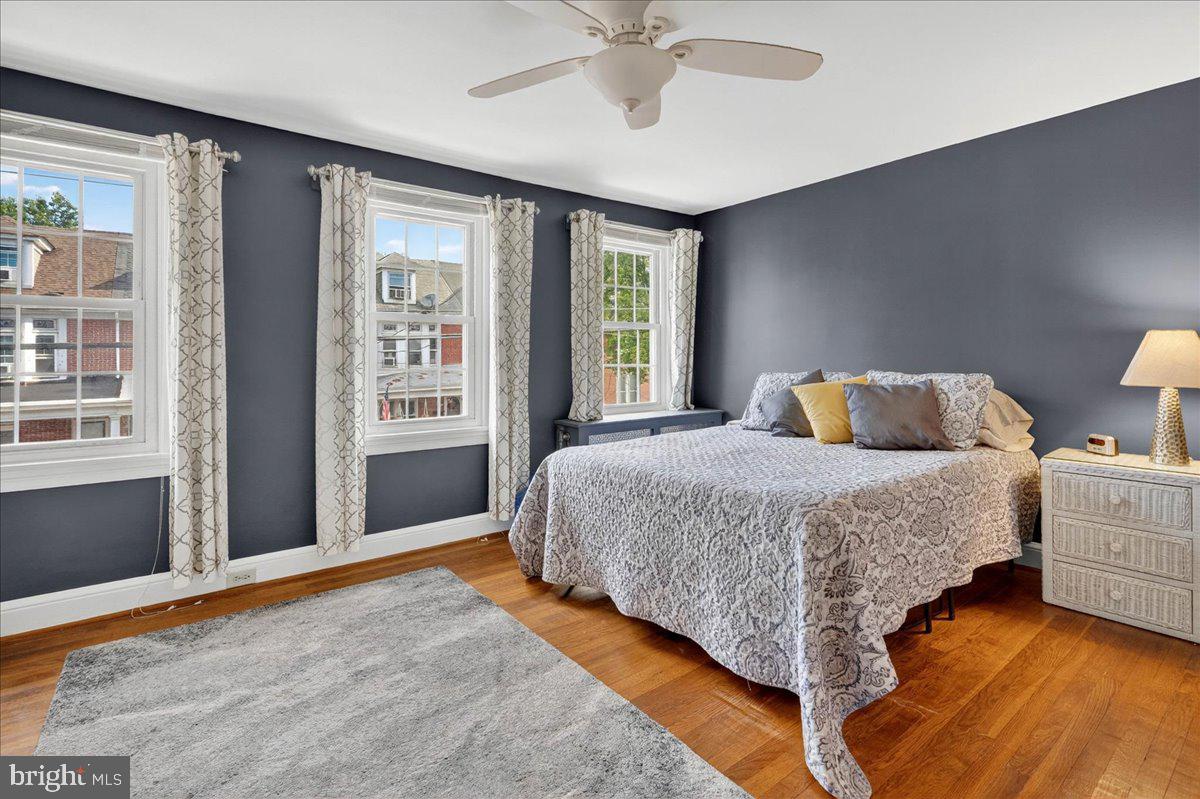 54 Chestnut Street Pottstown, PA 19464 - Photo 19 of 44 a bedroom with a large bed and a window