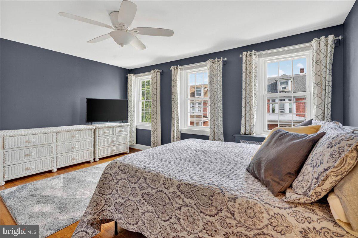 54 Chestnut Street Pottstown, PA 19464 - Photo 22 of 44 a bedroom with a bed and a flat screen tv