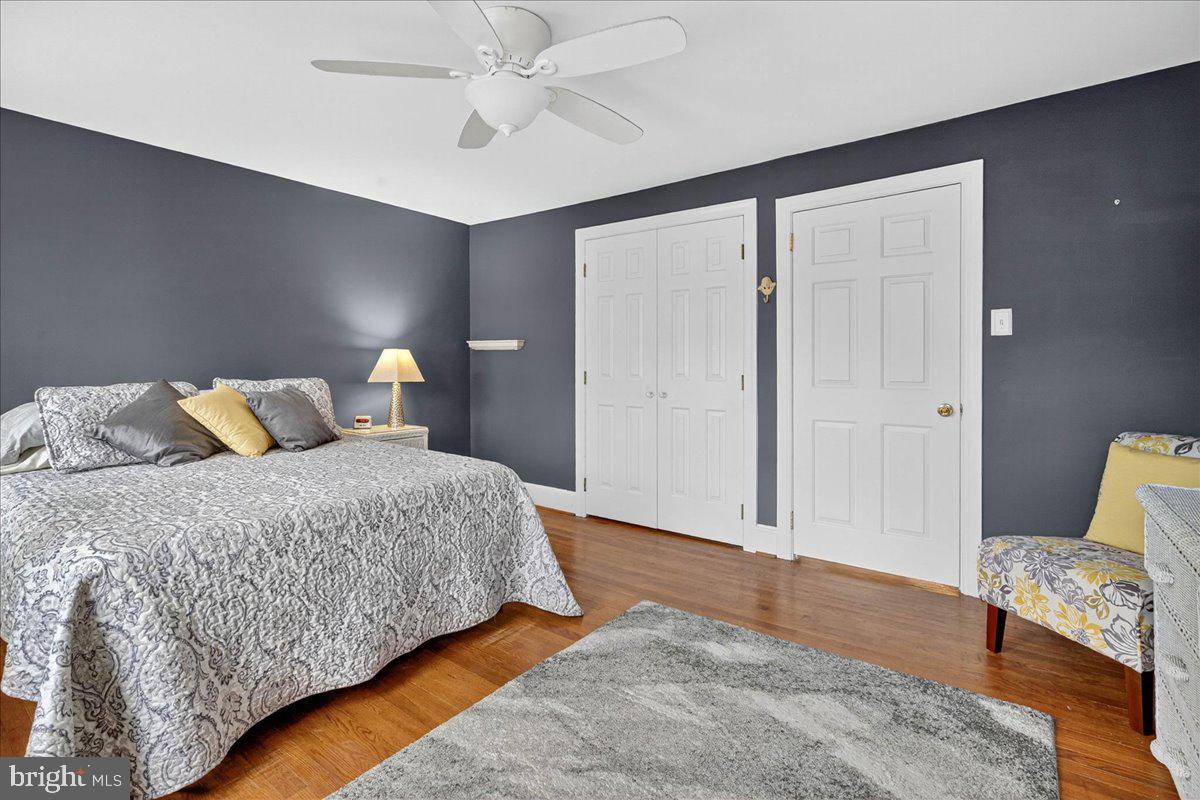54 Chestnut Street Pottstown, PA 19464 - Photo 23 of 44 a bedroom with a bed and wooden floor