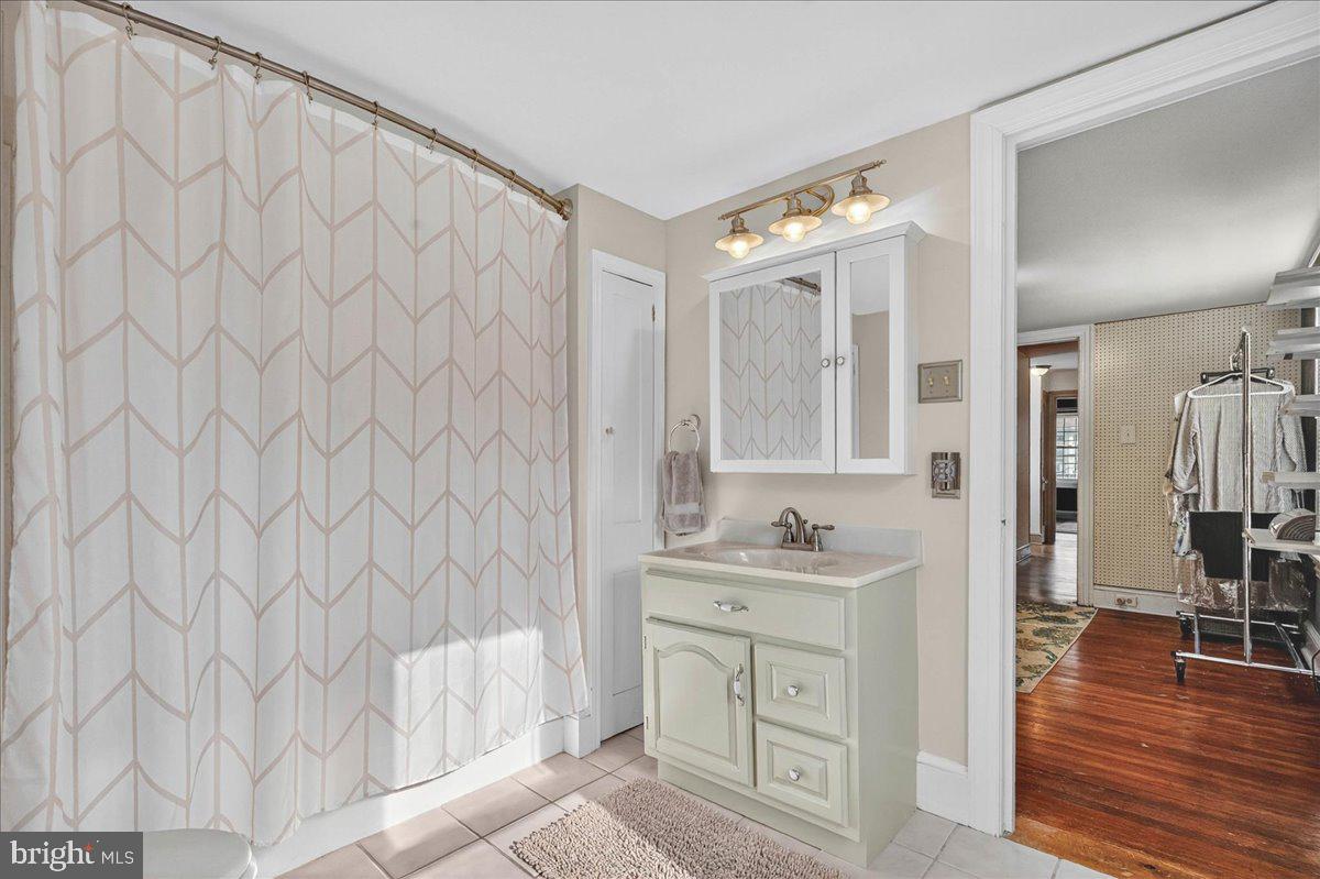 54 Chestnut Street Pottstown, PA 19464 - Photo 29 of 44 a bathroom with a sink and a mirror