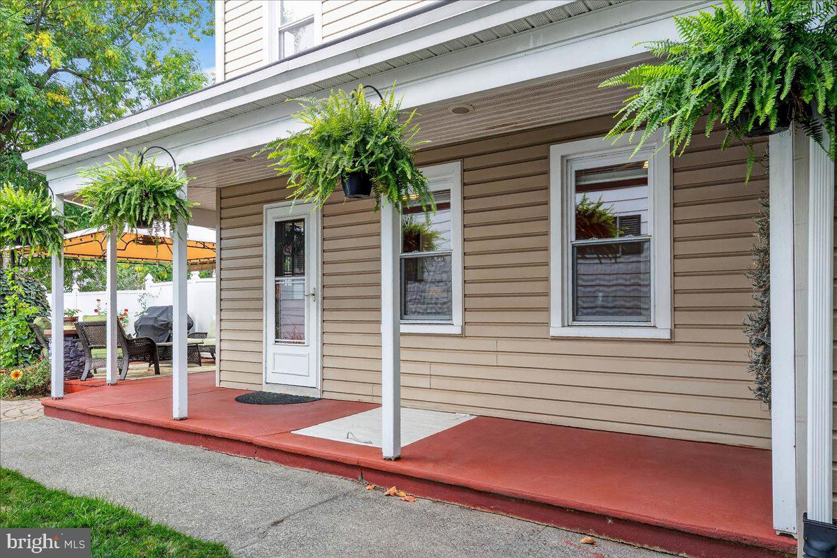 54 Chestnut Street Pottstown, PA 19464 - Photo 35 of 44 a view of front door and potted plants