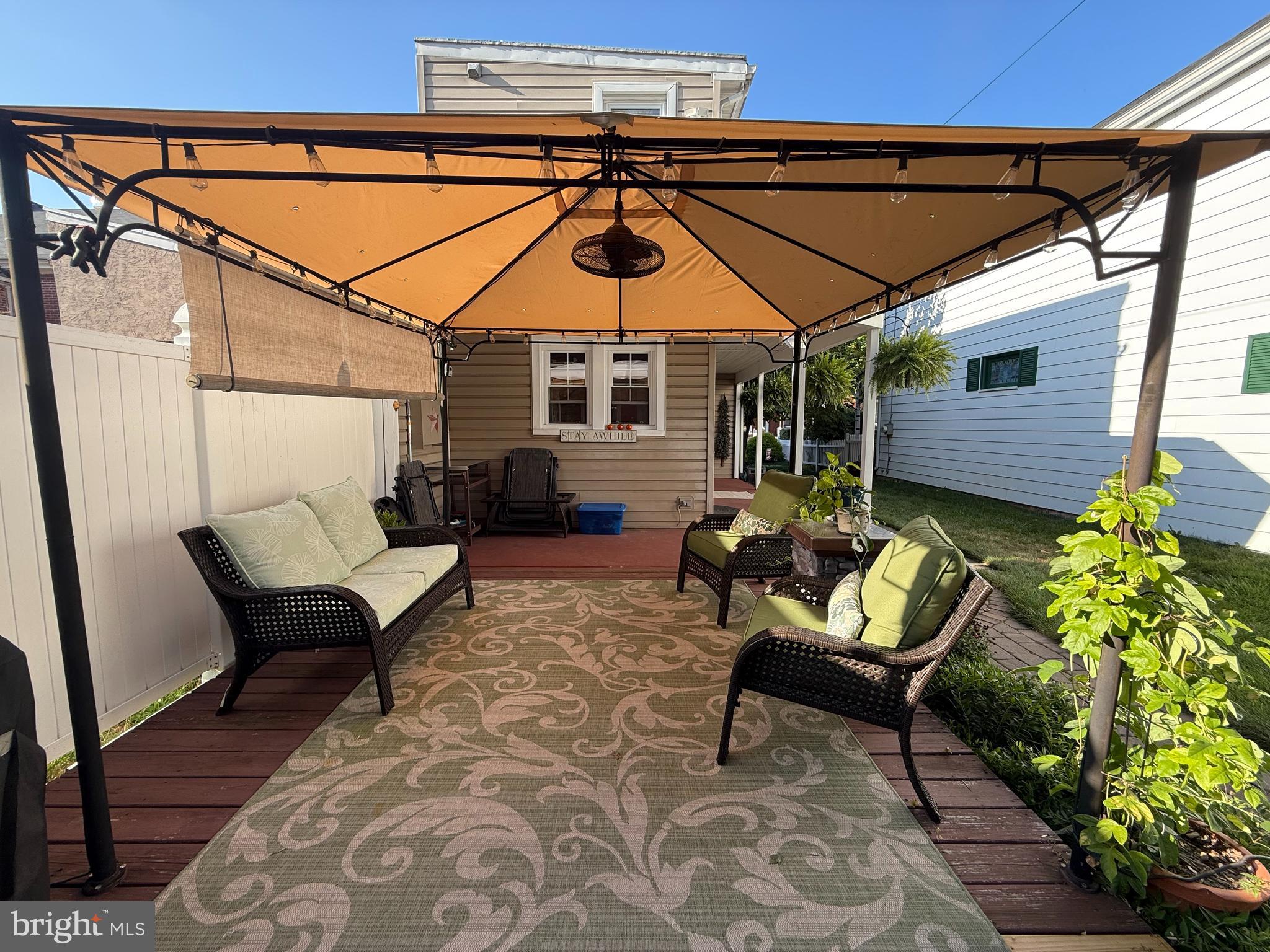 54 Chestnut Street Pottstown, PA 19464 - Photo 38 of 44 a view of a chairs and table in the patio