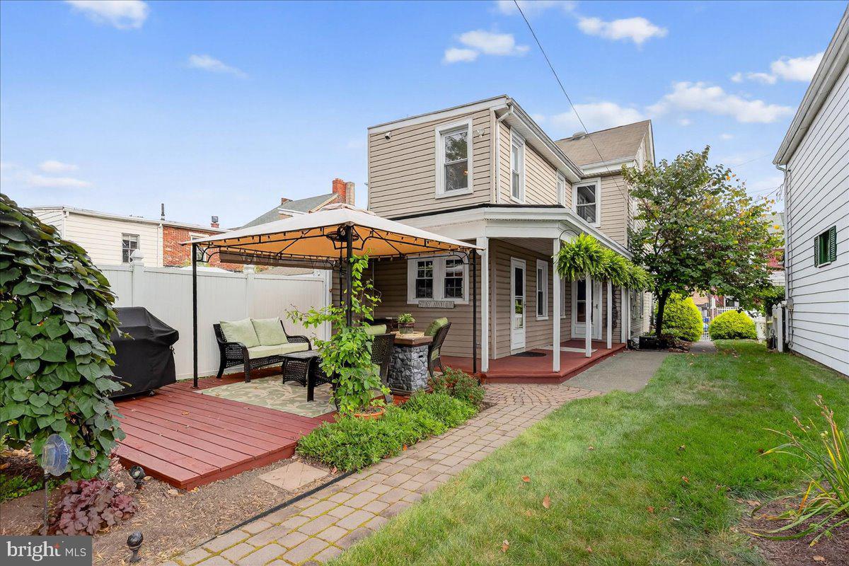 54 Chestnut Street Pottstown, PA 19464 - Photo 39 of 44 a view of a house with a yard and sitting area