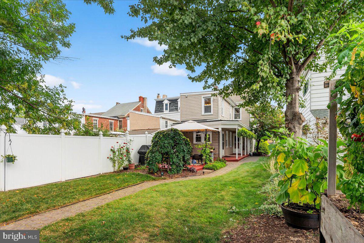 54 Chestnut Street Pottstown, PA 19464 - Photo 40 of 44 a front view of a house with garden