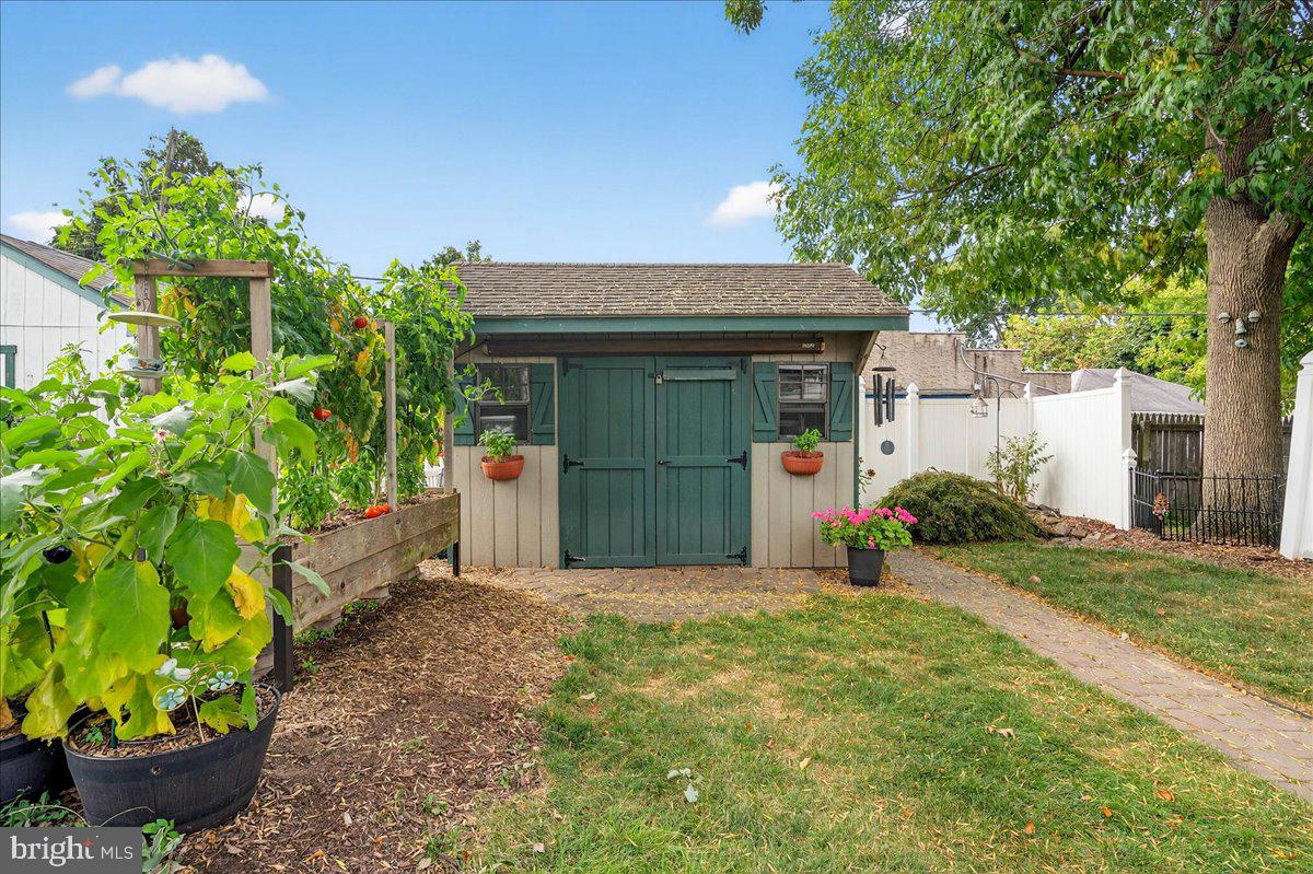 54 Chestnut Street Pottstown, PA 19464 - Photo 42 of 44 a front view of a house with a yard