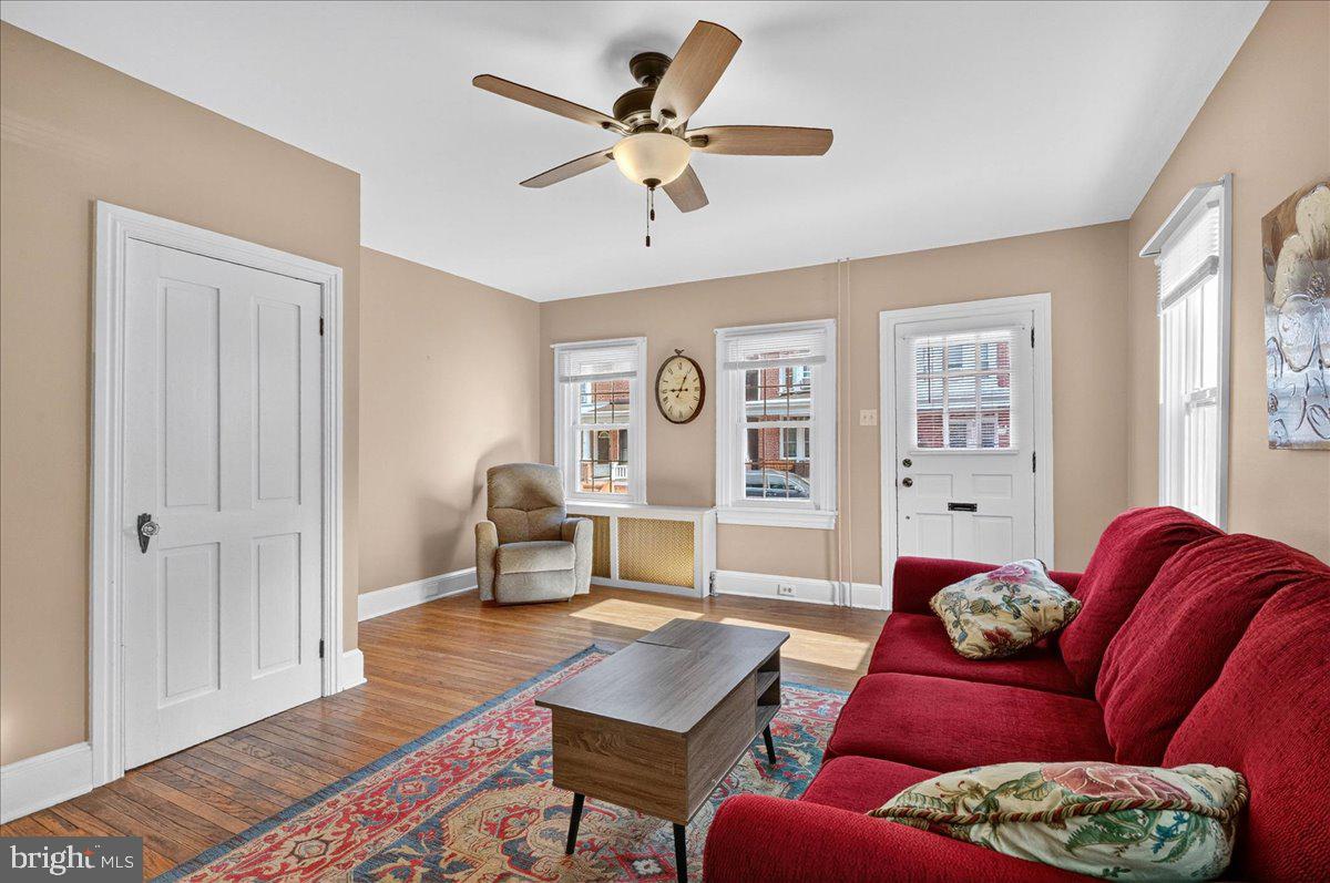 54 Chestnut Street Pottstown, PA 19464 - Photo 7 of 44 a living room with furniture and wooden floor
