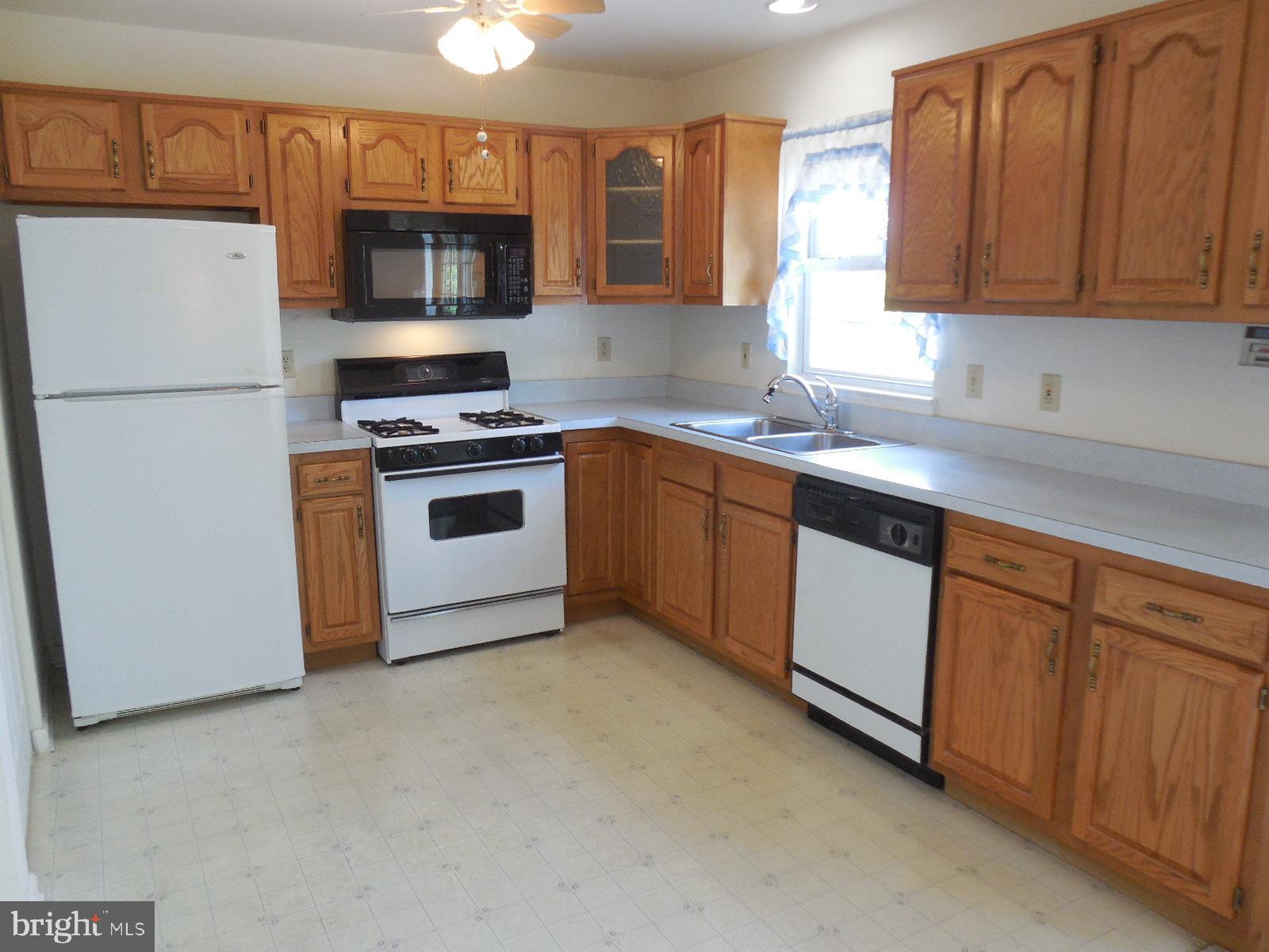 2817 Robin Road York, PA 17404 - Photo 20 of 44 A Bright Kitchen with lots of Cabinets & Counters