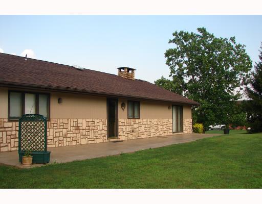 161 Airport Road Finleyville, PA 15332 - Photo 7 of 8 Patio/Deck. Look at the room for those Barbeques! Plus all the privacy you need. And the Seller was nice enough to resurface and seal this Patio floor. Its not only serviceable,but pretty too. Who could ask for more?