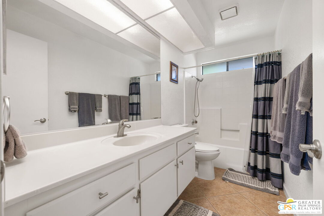 45688 Sutter Creek Road Indio, CA 92201 - Photo 34 of 51 a bathroom with a sink a toilet and shower