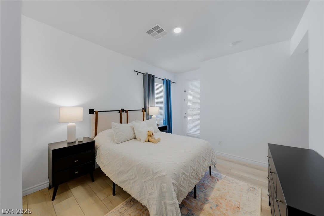 290 Rusty Ridge Lane Henderson, NV 89015 - Photo 37 of 61 First Floor Fully Furnished Next-Gen Suite w/separate entry, Kitchenette, living room, bed & bath, luxury vinly plank floors, fridge, convection microwave & Stackable washer/dryer.