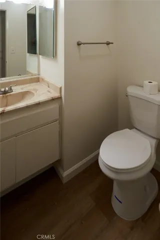 a bathroom with a toilet and a sink