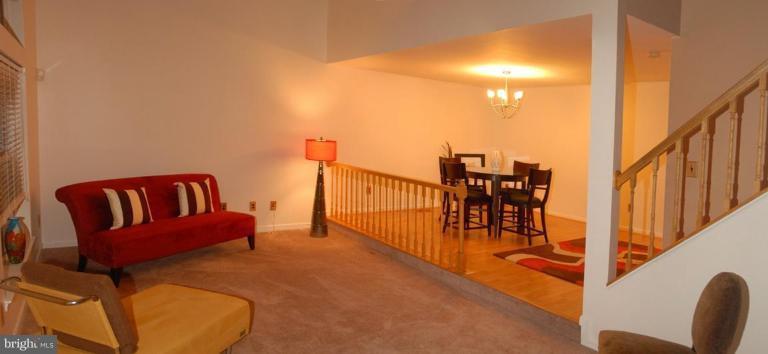 9300 Ispahan Loop Laurel, MD 20708 - Photo 3 of 12 Living Room/Dining Room