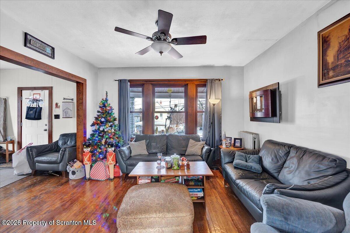 1026 Fairfield Street Scranton, PA 18509 - Photo 9 of 26 a living room with furniture and a large window