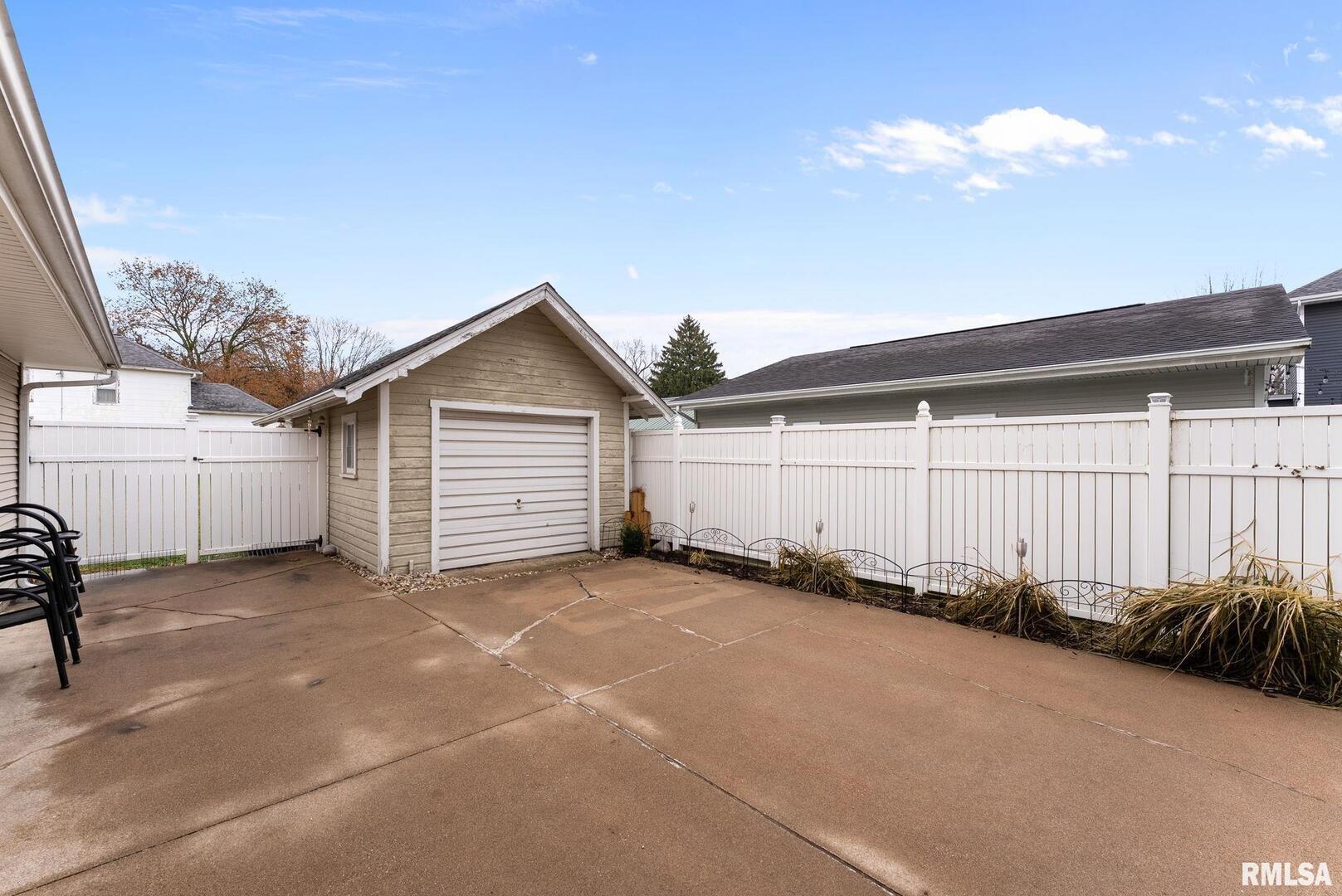 308 Northeast 3rd Avenue Aledo, IL 61231 - Photo 3 of 28 a view of a backyard