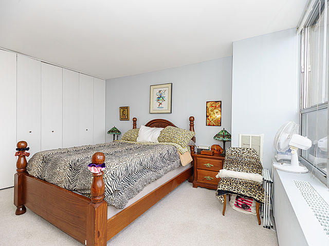 655 West Irving Park Road, Unit 2716 Chicago, IL 60613 - Photo 16 of 25 a bedroom with bed and window